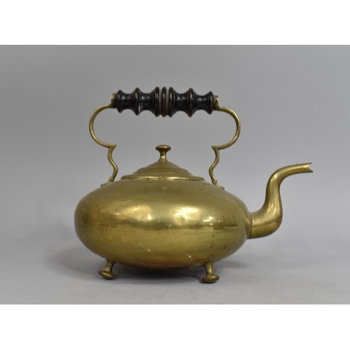 98 - A Brass Kettle of Circular Form, Turned Wooden Handle