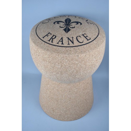 152 - A Novelty Stool in the Form of a Champagne Cork, 33cms Diameter and 48cms High