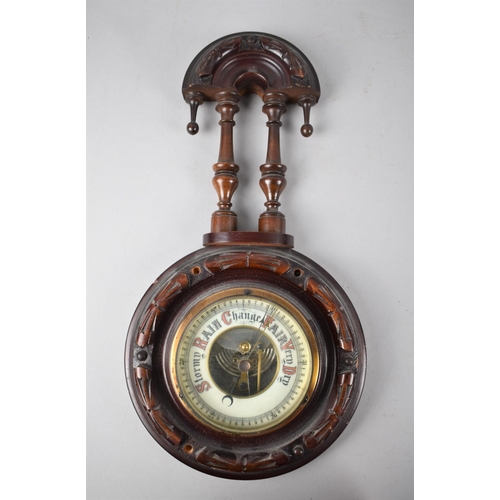 106 - A Late Victorian/Edwardian Wall Hanging Aneroid Barometer, 36cms High