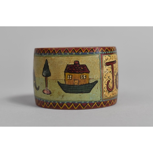 11 - An Edwardian Wooden Decorated Childs Napkin Ring decorated with Noah's Ark and Inscribed John