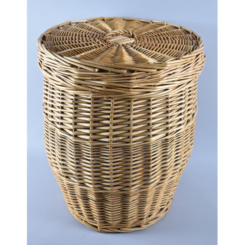 124 - A Late 20th Century Barrel Shaped Wicker Linen Basket, 39cms Diameter