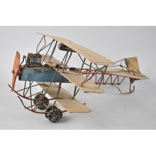 131 - A Modern Tin Plate Model of a Triplane, 38cms Long