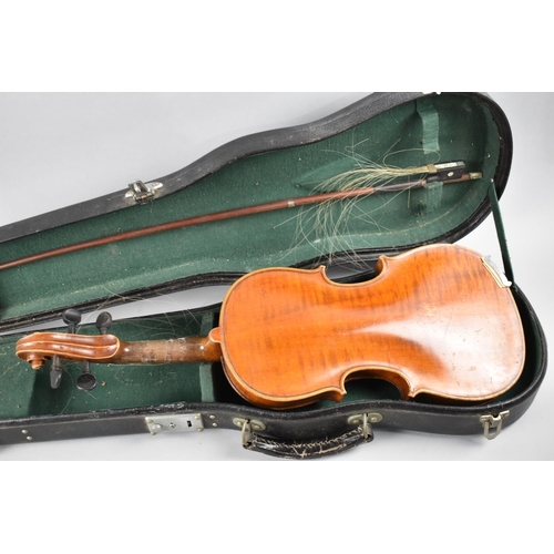 154 - A Cased Child's Violin and Bow