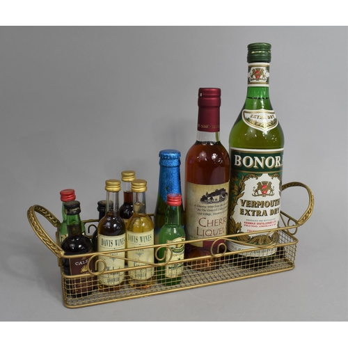 184 - A Wire Tray Containing Miniatures, Vermouth, Cherry Liquor and Babycham