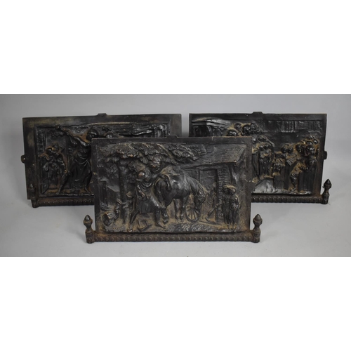 379 - A Set of Three Early 20th Century Cast Iron Fire Panel Fronts with Scenes to include Blacksmith, Cho... 