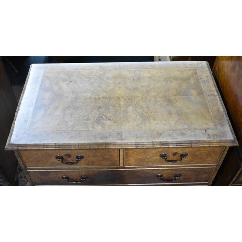 519 - A Burr Walnut Chest of Two Short and Three Long Drawers with Bracket Feet, String Inlaid Top (Top an... 