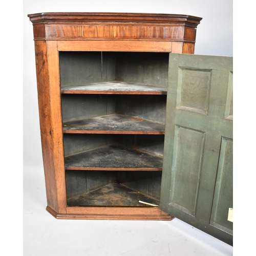 520 - A 19th Century Oak and Mahogany Wall Hanging Corner Cabinet with Panelled Doors to Shelved Interior,... 