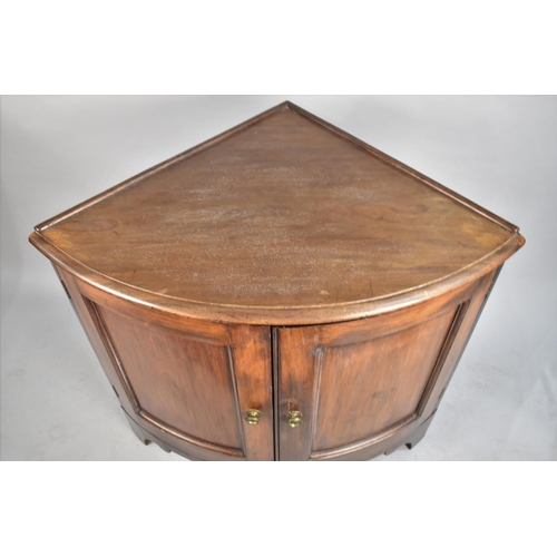 523 - A 19th Century Mahogany Free Standing Base Corner Cabinet with Bow Front and Panelled Doors, Bracket... 