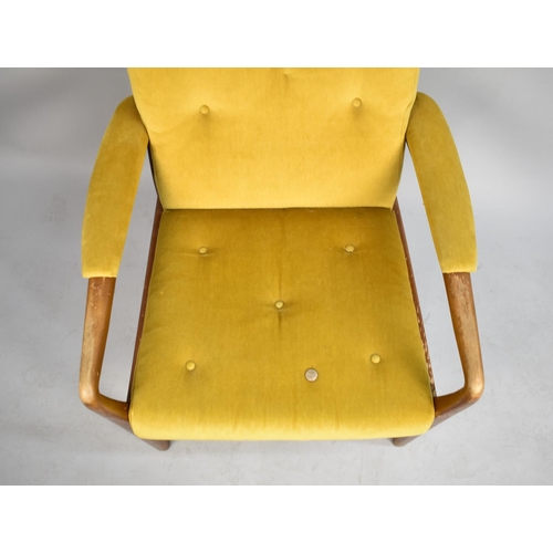 557 - A 1970's Buttoned Upholstered Open Armchair