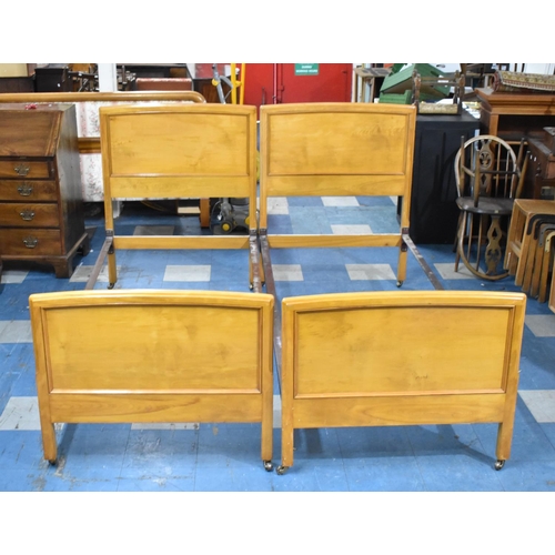 560 - A Pair of Vintage Walnut Single Bed Frames