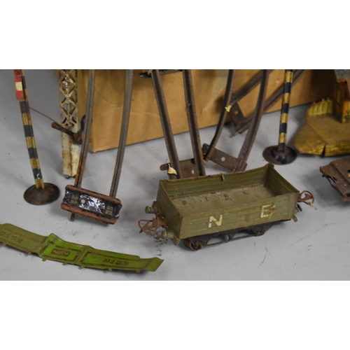 566 - A Collection of O Gauge Track, Signals Together with Clockwork Locomotive, Condition Issues