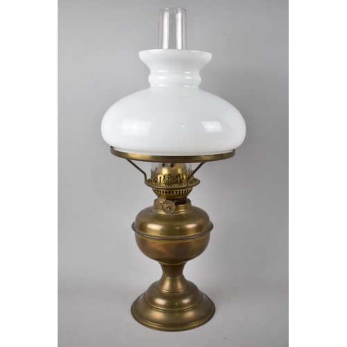 70 - A Vintage Brass Oil Lamp with Opaque Shade and Chimney, 49cms High