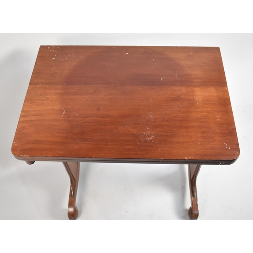 71 - A Late Victorian Mahogany Lift and Twist Tea Table on Scrolled Feet, 66cms Wide