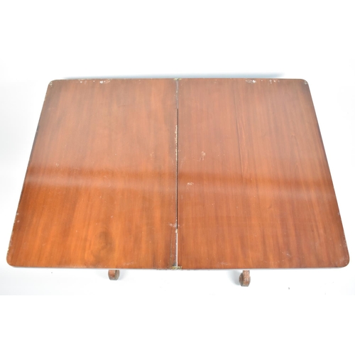 71 - A Late Victorian Mahogany Lift and Twist Tea Table on Scrolled Feet, 66cms Wide