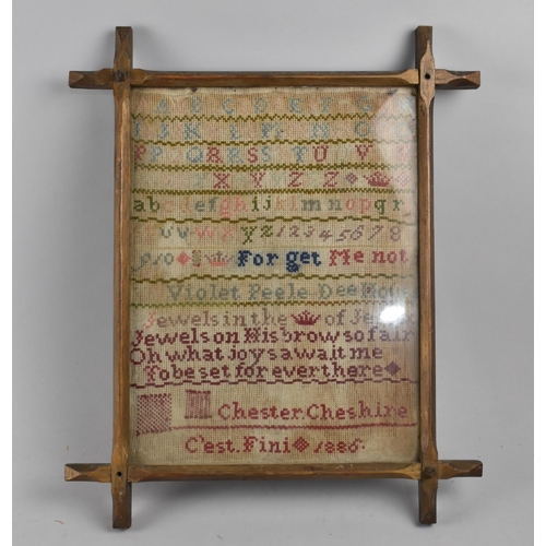 149 - A Framed Sampler by Violet Peele, Dee House, Chester in 1886, 26x34cms