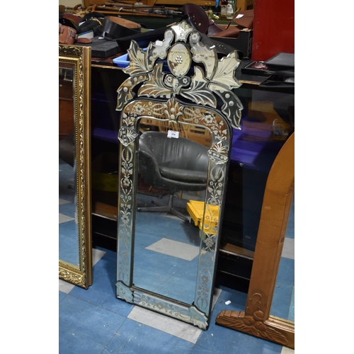 574 - A Mid 20th Century Ornate Continental Wall Mirror with Acid Etched Decoration, 110cm high and 47cm w... 