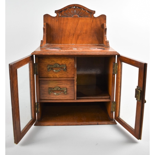 1 - A Edwardian Oak Smokers Cabinet with Glazed Door to fitted Interior, Glazed Galleried Back, 28cms Wi... 