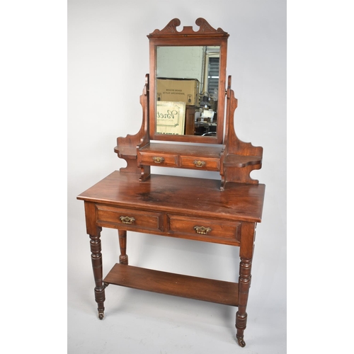 134 - An Edwardian Mahogany Dressing Table with Swing Mirror, Two Jewel Drawers, Two Central Drawers and P... 