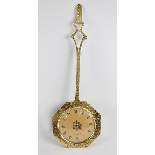 153 - A Mid 20th Century Brass Wall Hanging Clock in the Form of an Octagonal Skimmer, 50cms High, Working