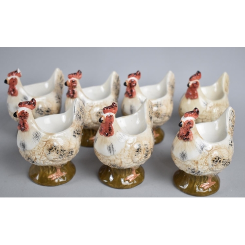 175 - A Set of Seven Ceramic Egg Cups in the Form of Hens, One AF, 10cm high