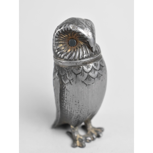 21 - A Late 19th/Early 20th Century Pewter Novelty Pepper Pot in the Form of an Owl, 7.5cms High