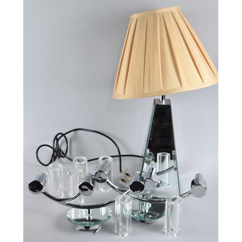 259 - A Modern Mirrored Pyramid Shaped Table Lamp and Pair of Chromed Three Branch Wall Lights