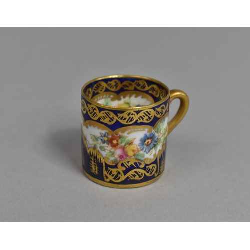 273 - A Miniature Crown Staffordshire Cup decorated with Hand Painted Floral Design on Cobalt Blue and Gil... 