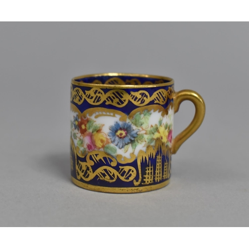 273 - A Miniature Crown Staffordshire Cup decorated with Hand Painted Floral Design on Cobalt Blue and Gil... 