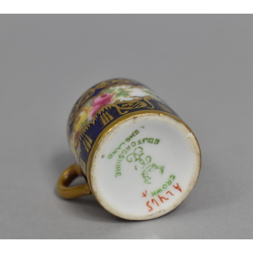 273 - A Miniature Crown Staffordshire Cup decorated with Hand Painted Floral Design on Cobalt Blue and Gil... 