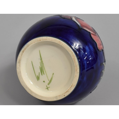 380 - A Moorcroft Vase, Anemone Pattern on Blue Ground, 20cm high