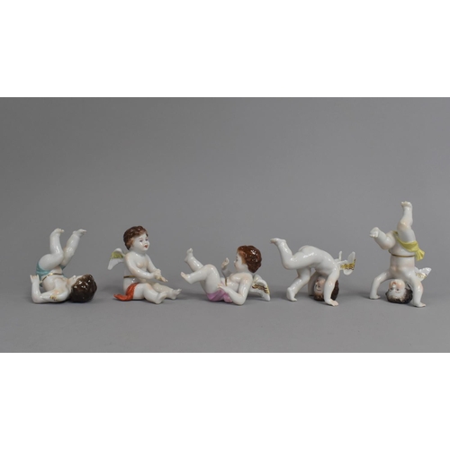 388 - A Set of Five Aelteste Volkstedter Porcelain Cherub Ornaments, 11cm high