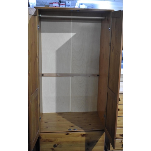 516 - A Modern Pine Double Wardrobe with Base Drawer, 87cm wide