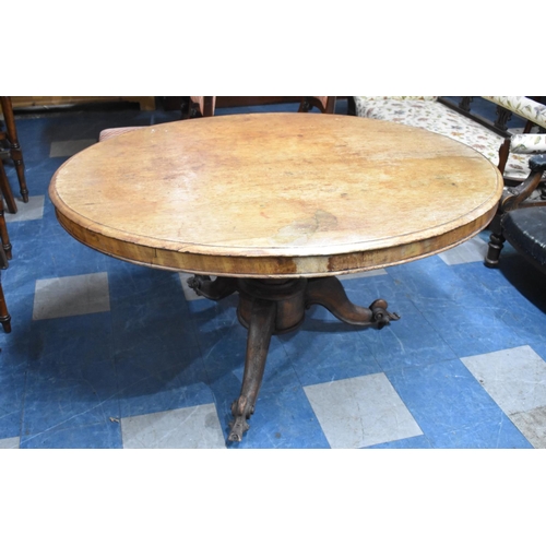 532 - A Late 19th Century Mahogany Oval Snap Top Breakfast Table with Scrolled Supports and Carved Feet, 1... 