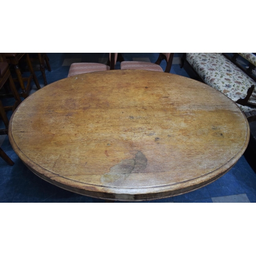 532 - A Late 19th Century Mahogany Oval Snap Top Breakfast Table with Scrolled Supports and Carved Feet, 1... 