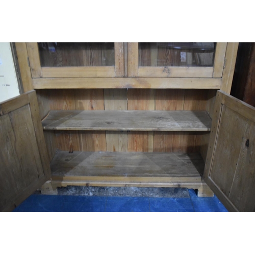 537 - An Edwardian Pine Housekeeper's Cupboard with Panelled Doors to Base, Glazed Doors to Upper Shelved ... 