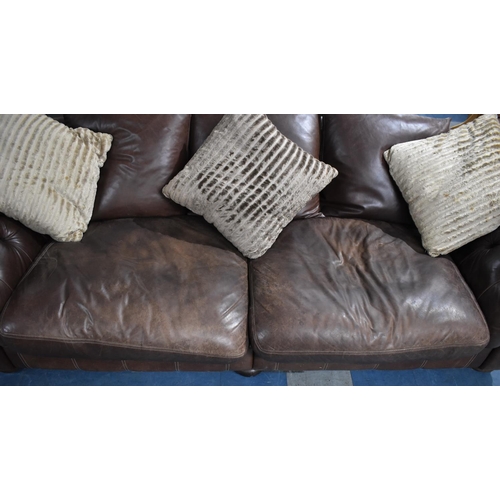 545 - A Very Large Modern Buttoned Leather Four Seater Sofa with Scrolled Arms and Scatter Cushions, 290cm... 