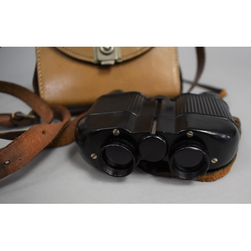 56 - A Small Pair of Leather Cased Newmarket Binoculars in Bakelite Case