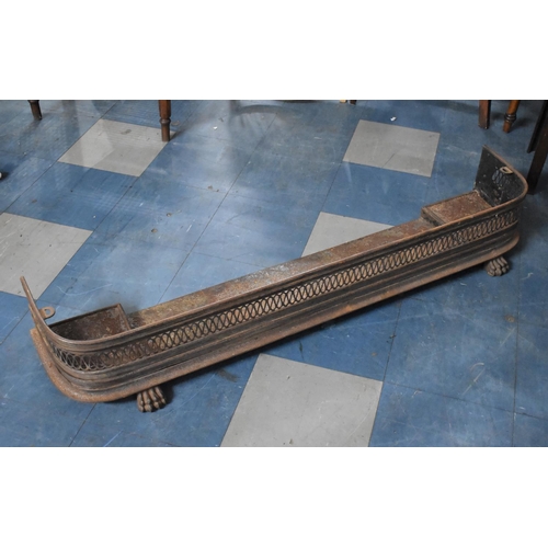 561 - A Heavy Late Victorian Cast Iron Fire Kerb with Pierced Floral Decoration, 136cm wide