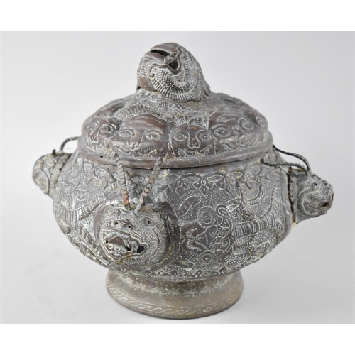 61 - An Oriental Bronze Censer of Compressed Globular Form Having Four Horned Masks to Body and Larger Ex... 