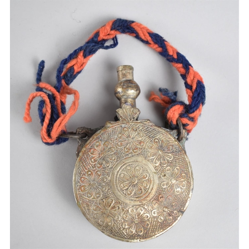 64 - An Indo-Persian Circular Powder Flask with Engraved Decoration, 9cms diameter