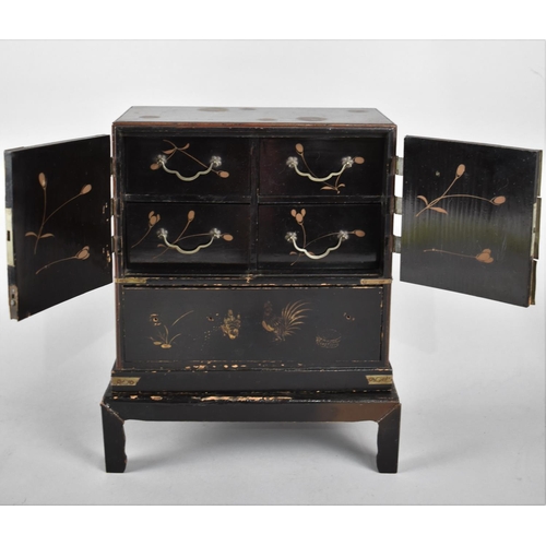 67 - An Early/Mid 20th century Oriental Lacquer Collectors Cabinet with Gilt Decoration with Birds and Fl... 