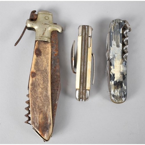 79 - A Collection of Three Vintage Multitool Knives