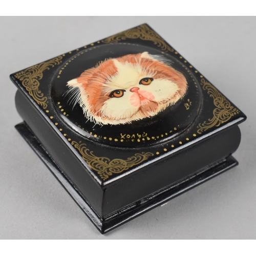 12 - A Russian Lacquered Square Box, Hinged Lid Decorated with Cat, Signed, 6.5cms Square