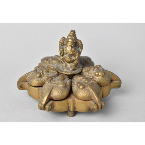 30 - A Small Indian Brass Altar Top Incense Box with Six Hinged Compartments and Raised Study of Ganesh, ... 