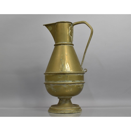 59 - A Large 19th Century Brass Ewer or Church Flagon, 48cm High