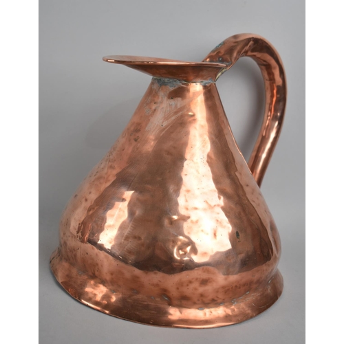 69 - A Vintage Copper Measuring Jug, 26cms High