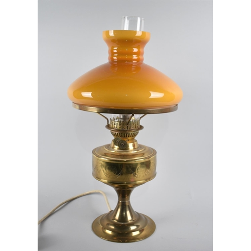 71 - A Mid 20th Century Brass Table Lamp in the Form of an Oil Lamp, 49cms High