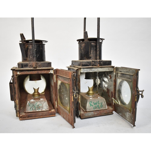 106 - A Pair of Vintage Black Painted Railway Lamps with Double Bullseye Glass Lenses, Each 47cms High