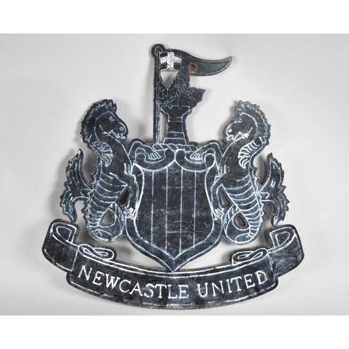 148 - A Fret Cut Metal Wall Mounting for Newcastle United Football Club, 49cm high