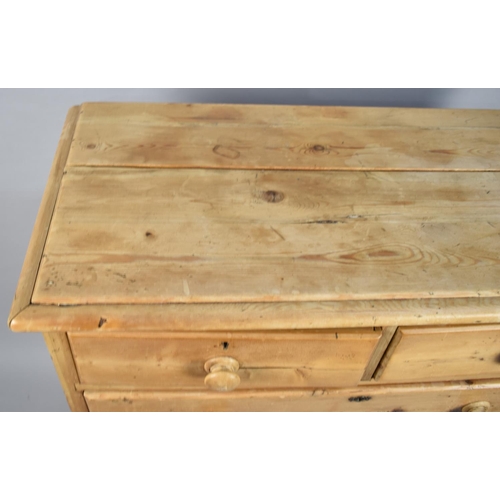 165 - A Stripped Pine Bedroom Chest of Two Short and Three Long Drawers, 100cm wide